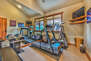 Workout room on Upper Level with Treadmill, Elliptical, Weights and TV