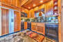 Fully Equipped Chef's Kitchen with Viking Appliances, Granite Countertops, and Bar Seating for 4