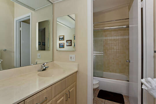 Master Bath with Dual Sinks and Shower.