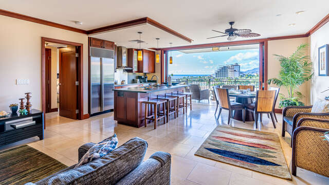 Large Pocket Doors in the kitchen of this Ko Olina beach villa in Hawaii open to the Lanai.