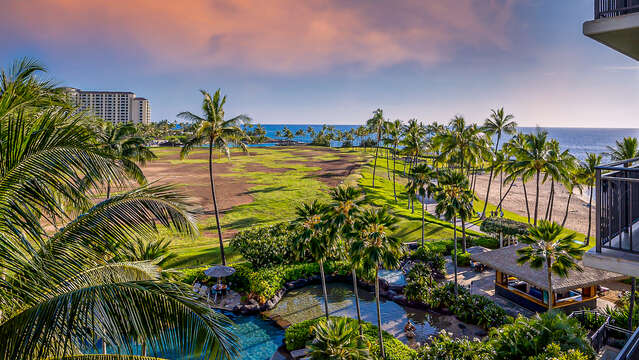 Large Lanai overlooking the pool outside our Oahu Ko Olina Beach Villa, with a dashing look of the Pacific blue