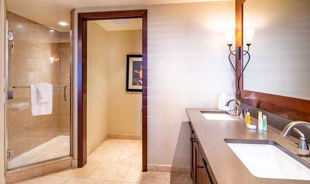Step-in Shower & Dual Sinks in the Master Bath with Upgraded Furnishings