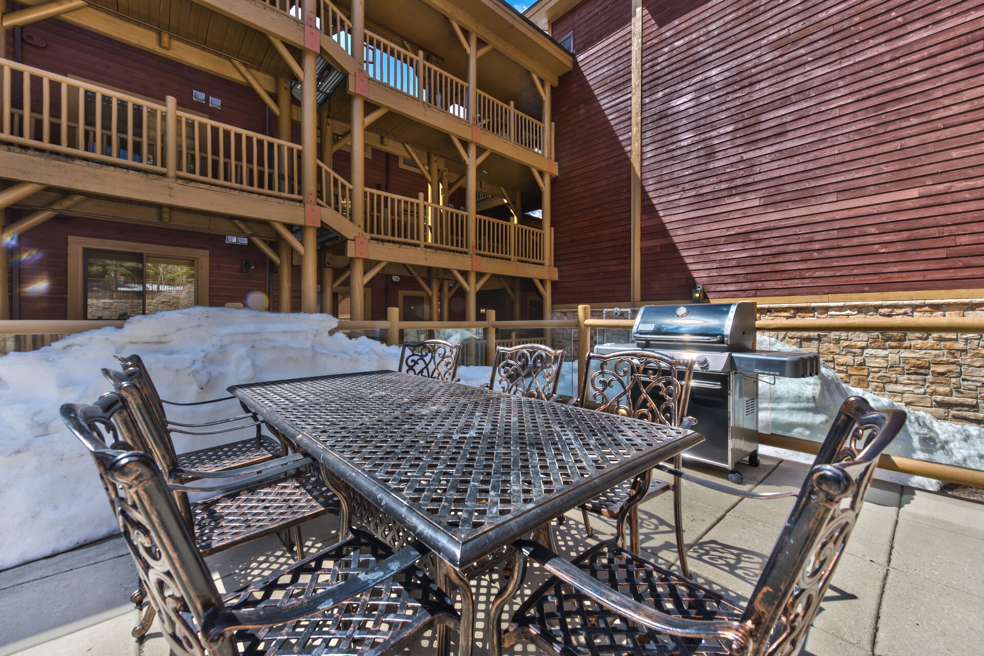 Black Bear Lodge Communal Barbecue Grill and Seating by Pool