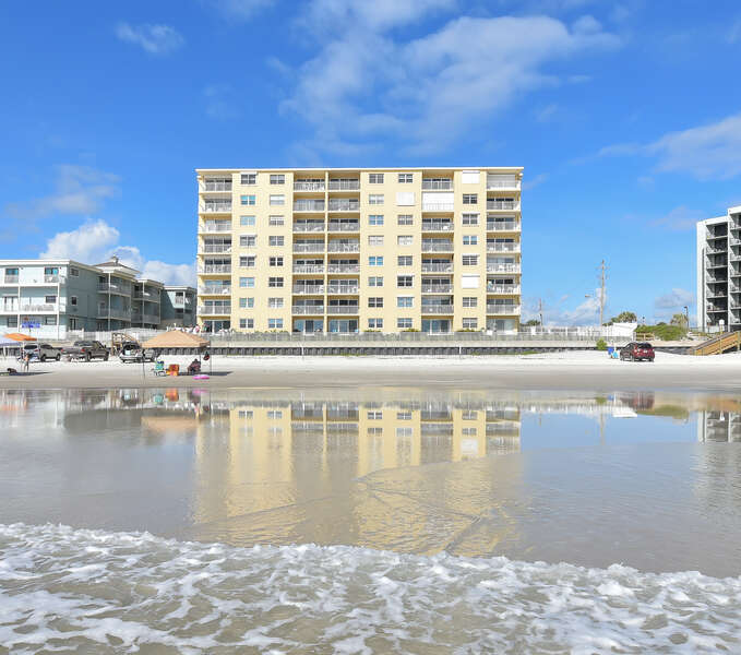 View of the complex of this private condo in new Smyrna Beach from beach.