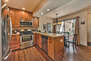 Fully Equipped Kitchen with Custom Cabinets, Granite Counters, Stainless Steel Appliances