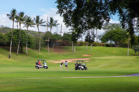 Golf course located next to this Ko Olina condo rental.