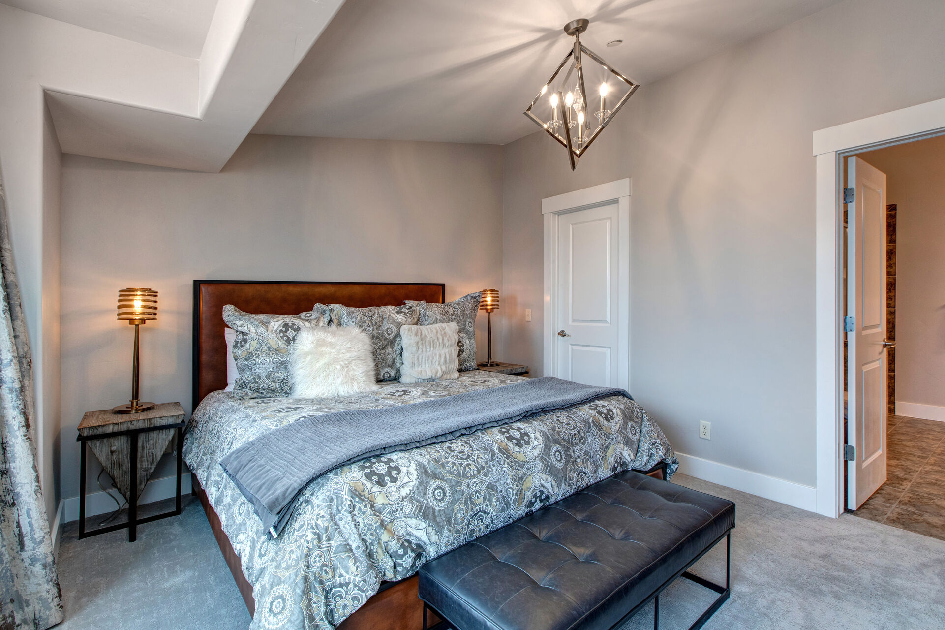 Master Bedroom with King Bed, Smart TV, and En Suite Bathroom