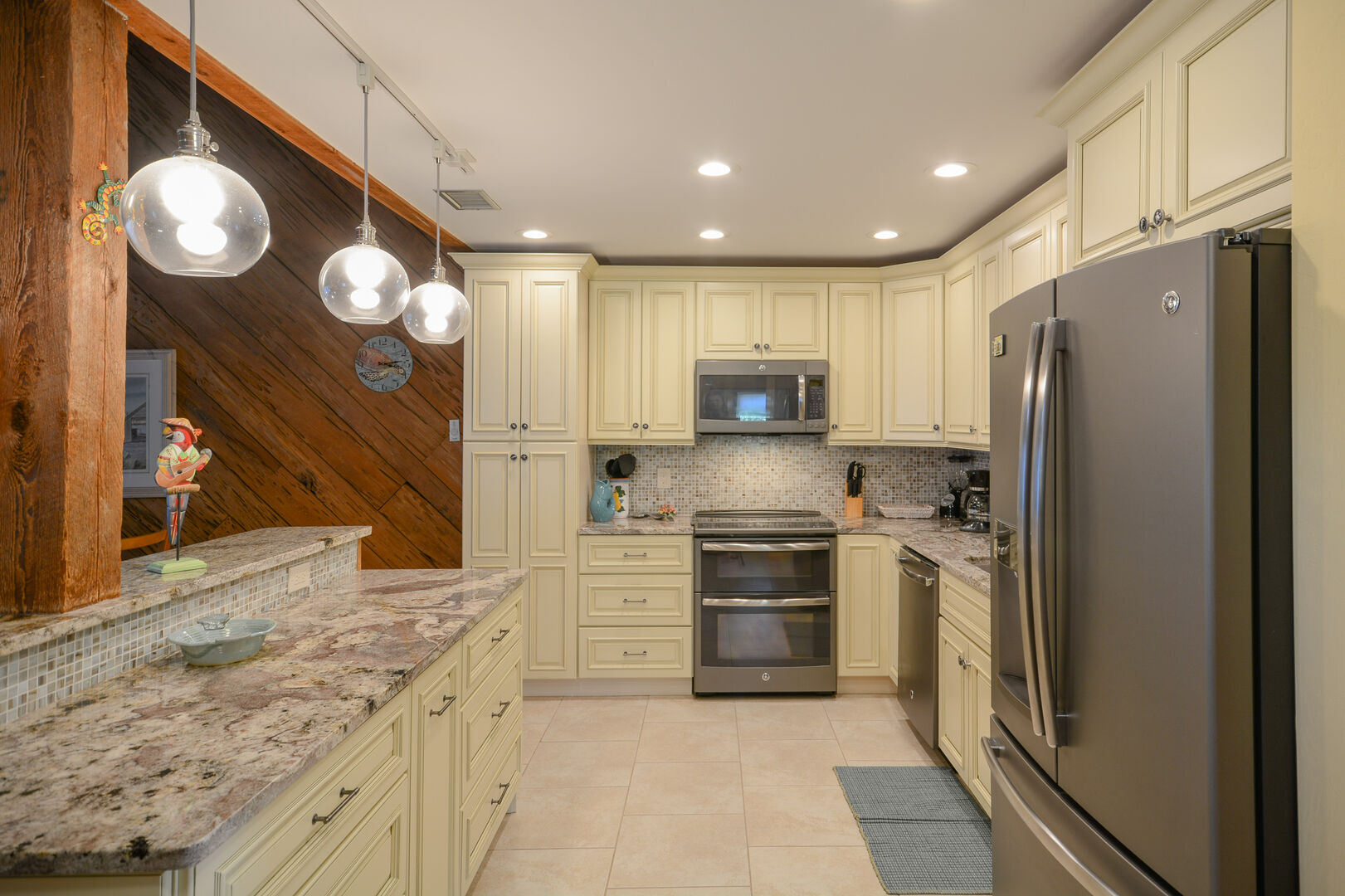 The totally renovated, ocean view kitchen is fully equipped.