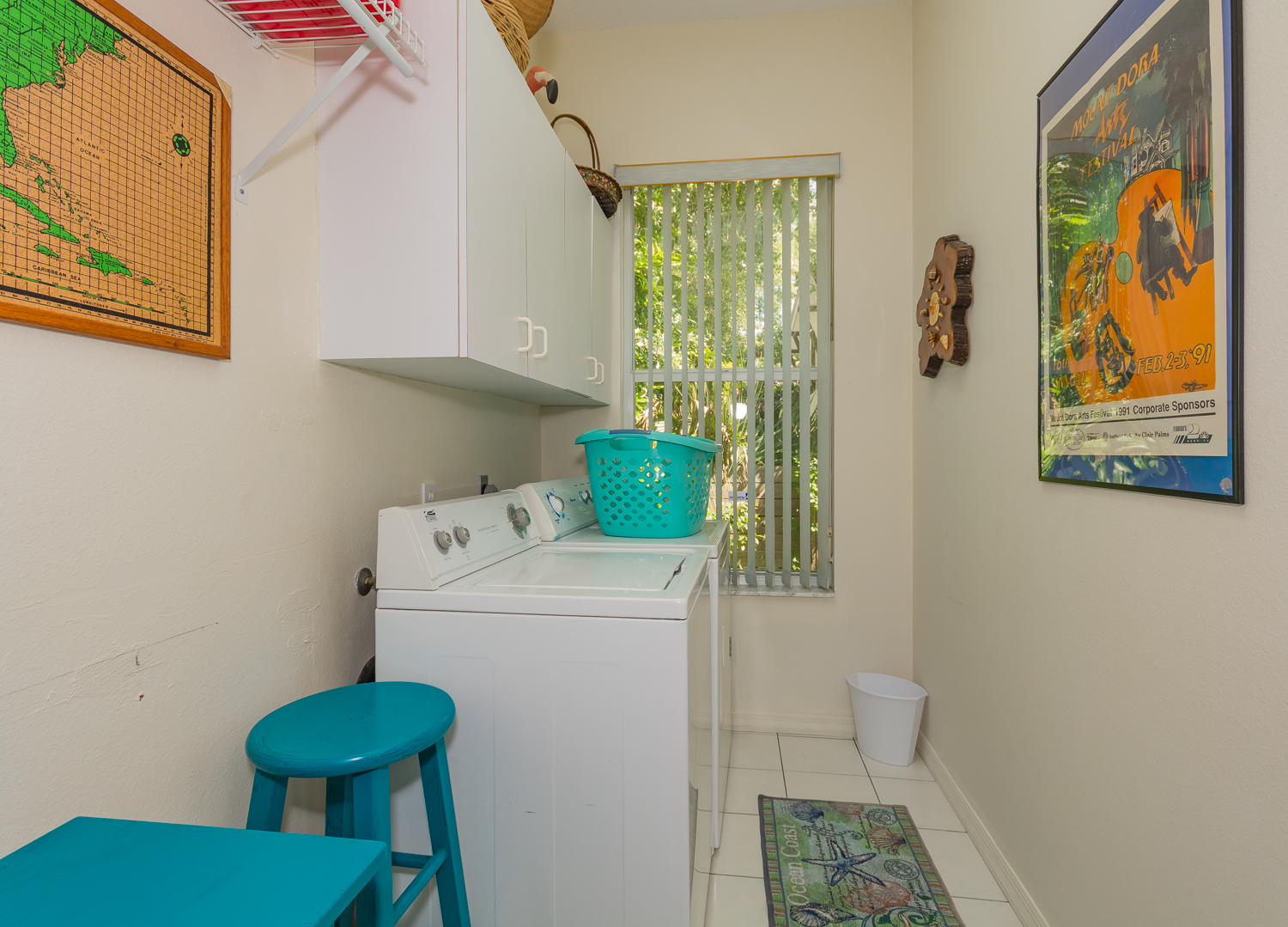 Laundry room with full sized washer and dryer.