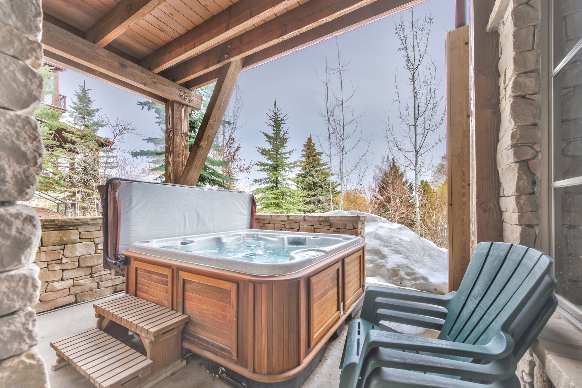 6-seat hot tub on lower level on private patio overlooking Park City Golf Course and mountains