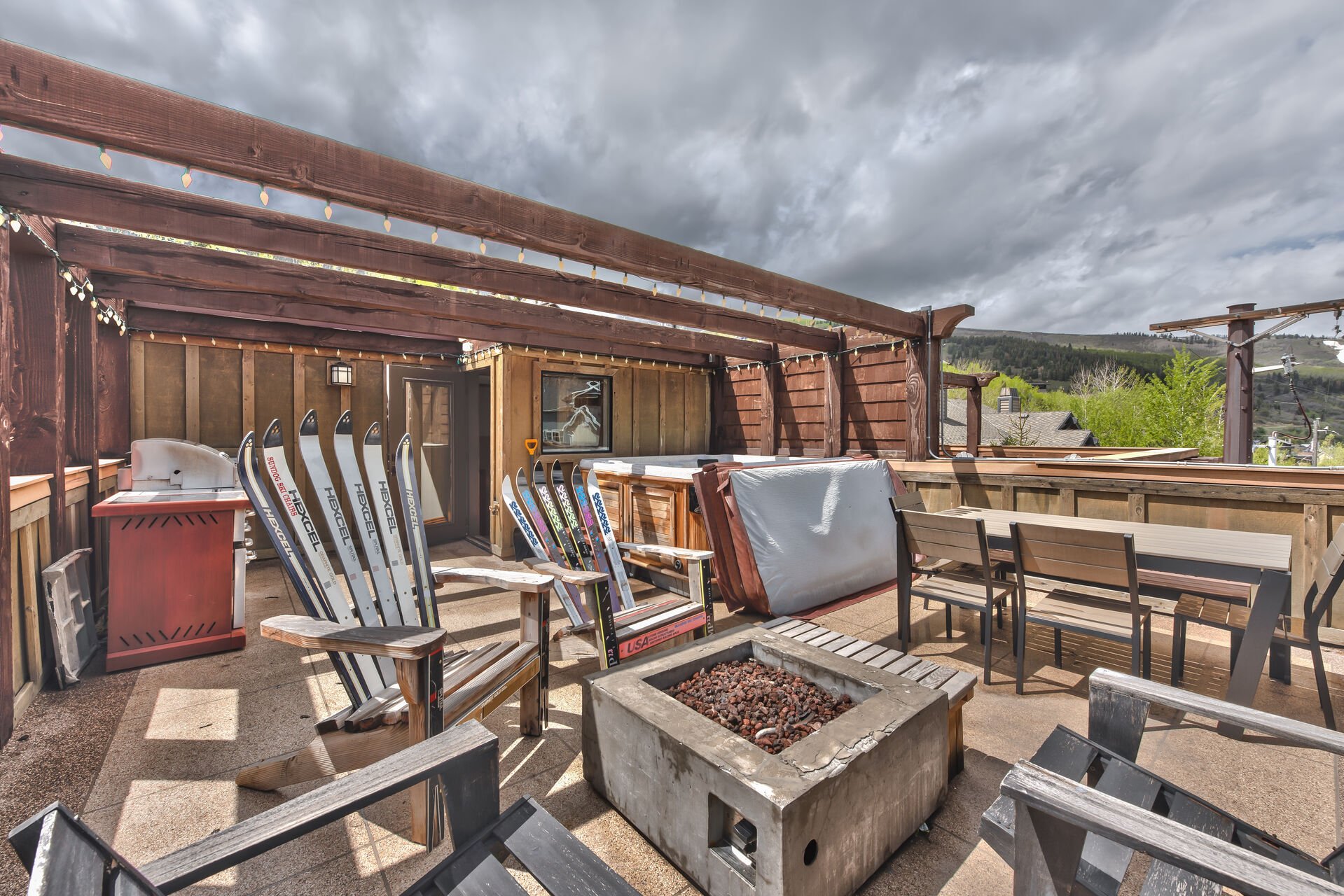 Rooftop Deck with a 7-Seat Hot Tub, Built-in BBQ Grill, Fire Pit and Patio Seating