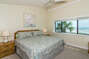 The most spacious bedroom in the house specifically for the primary occupants to relax and unwind.