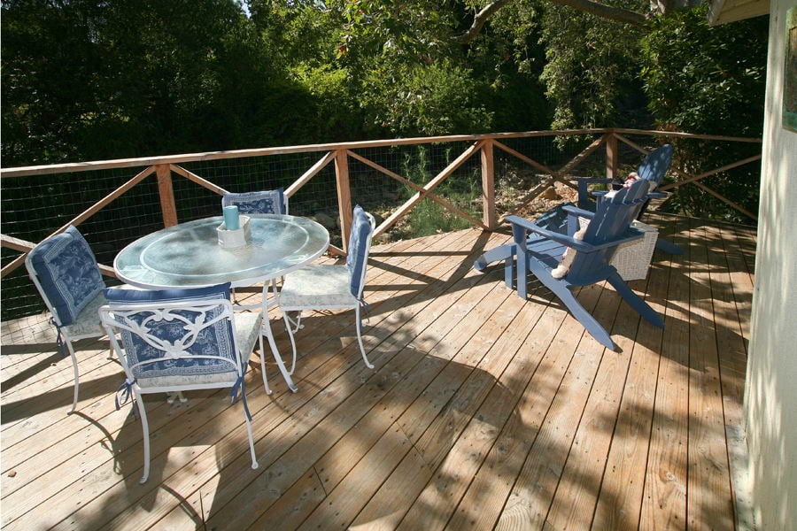 Rear deck overlooking secluded natural creek bed