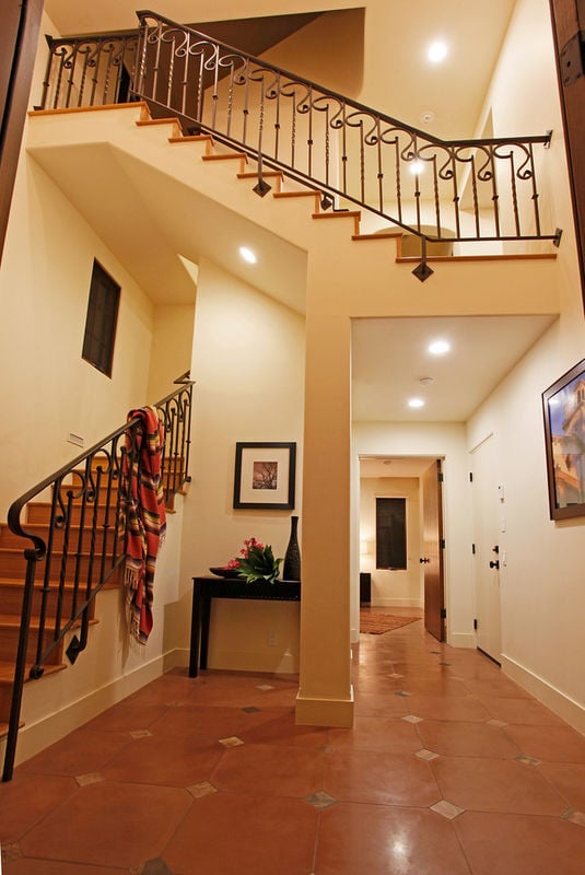 A welcoming entry leads to the 1st floor Master Suite