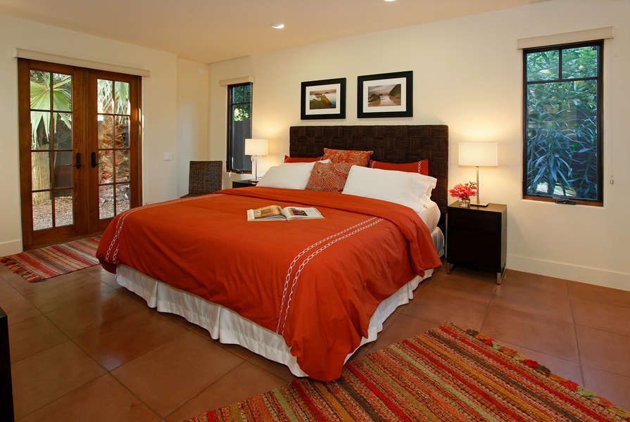 The 1st floor Master Suite opens to private patio