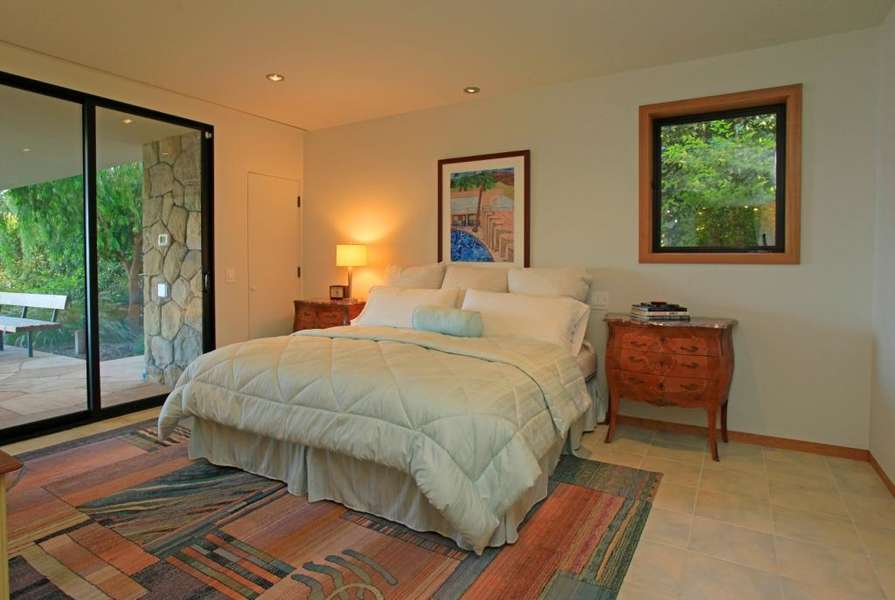 Private lower level bedroom #3 offers pool & ocean views