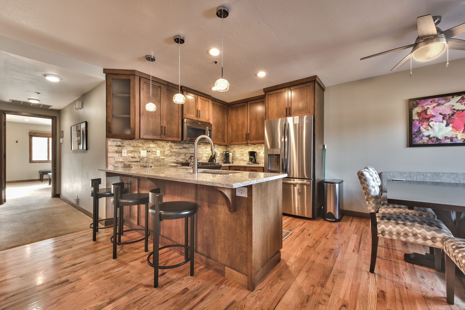Kitchen and Dining Area with Hardwood Floors