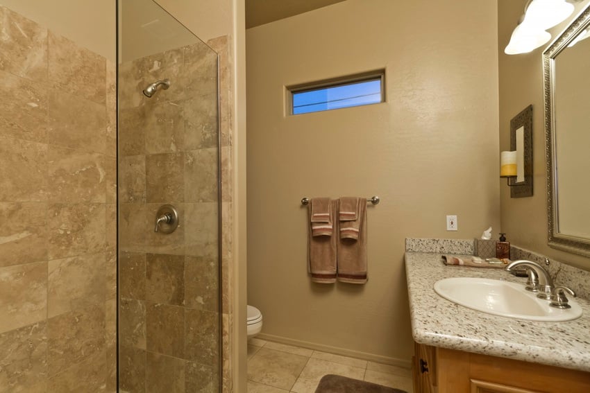 The guest bathroom has a great walk-in shower