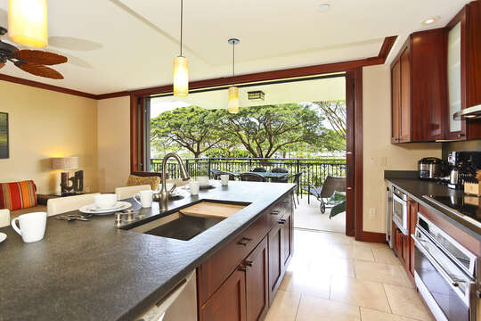 Fully equipped Kitchen with view of garden and ocean