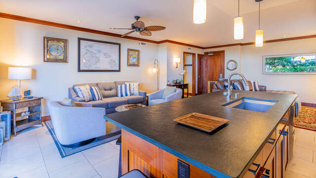 This vacation rental in Ko Olina Oahu has a Roy Yamaguci Designed Kitchen, and features a spacious living room for hosting and gathering.