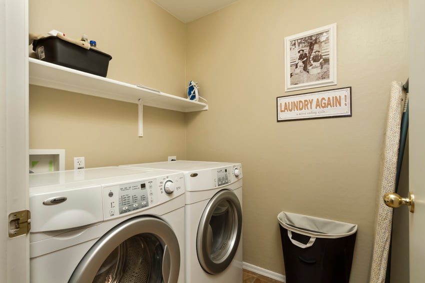 Laundry room with front loading washer and dryer