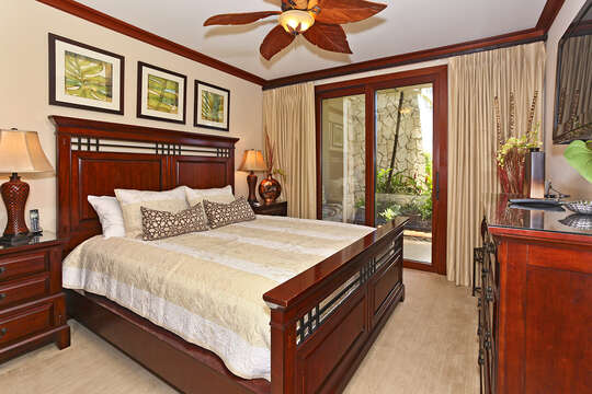 Master Bedroom with King Bed and direct access to beautifully maintained landscape and garden