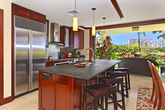 Roy Yamaguci Designed Kitchen with views out sliding doors to the lanai.