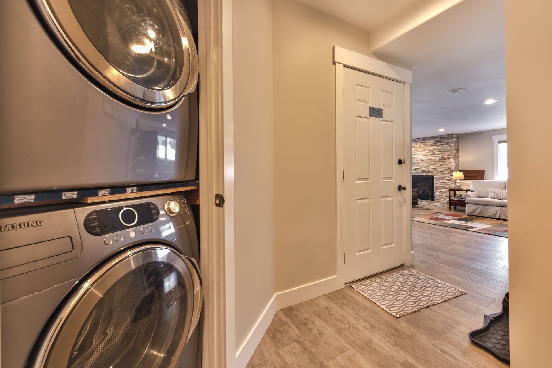 Lower level laundry with full size washer and dryer