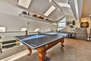 Loft game room with pool table that has ping pong top, 40