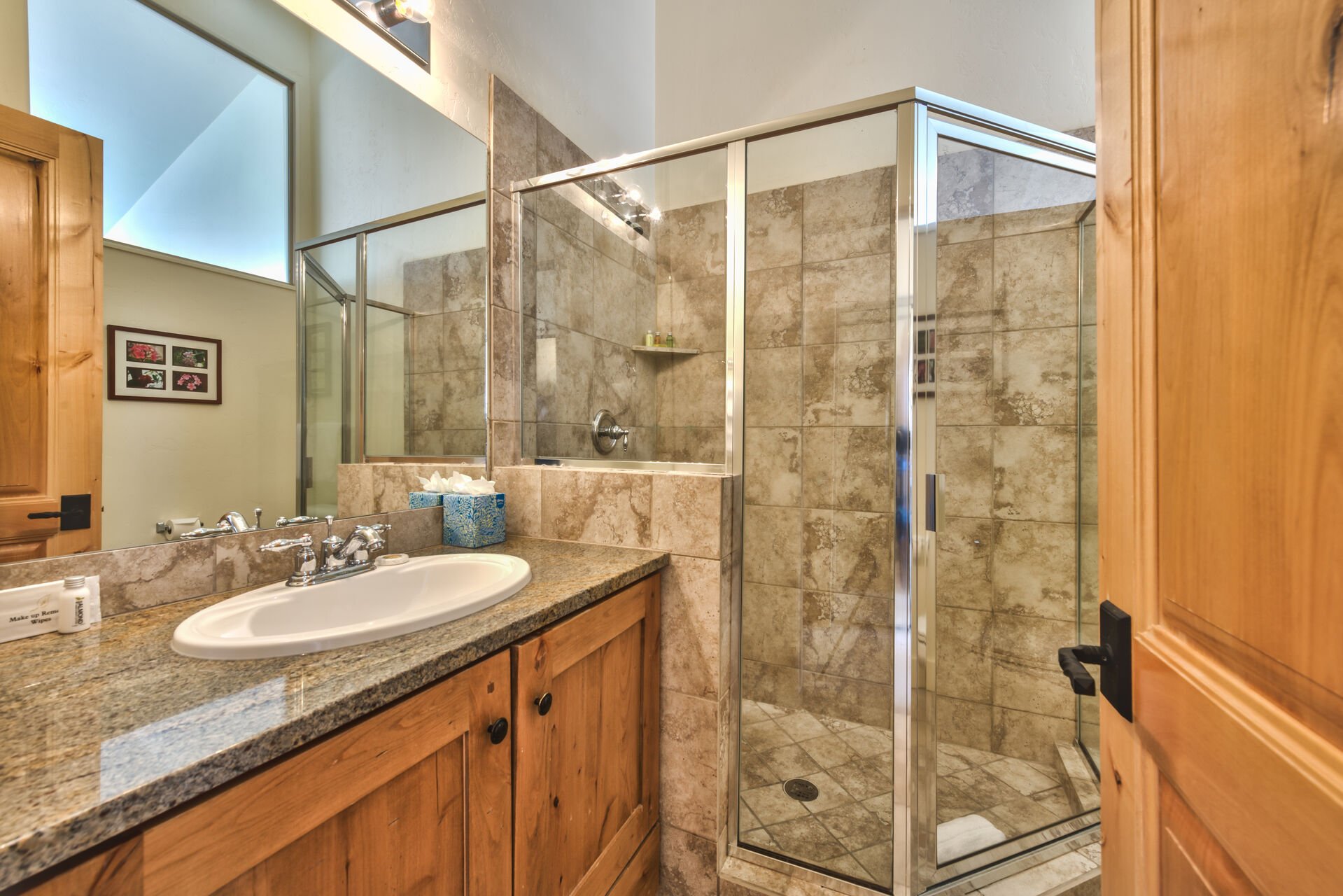 Master Bath with Dual Sinks and Tile Shower