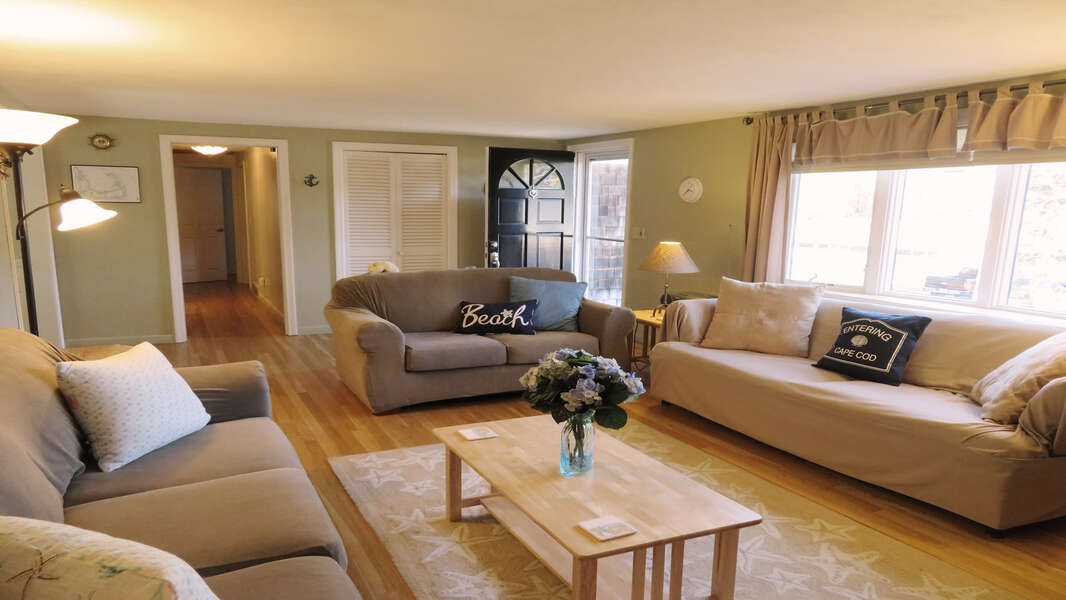 Lots of comfy seating plus a Queen sleep sofa in the living room- 26 Ridgevale Road South Harwich Cape Cod New England Vacation Rentals #BookNEVRDirectPlaceOnTheCape