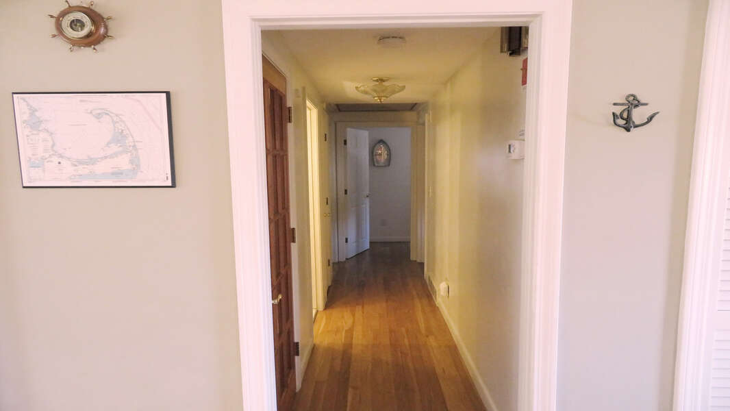 Hallway to the bedrooms and bathrooms - 26 Ridgevale Road South Harwich Cape Cod New England Vacation Rentals #BookNEVRDirectPlaceOnTheCape