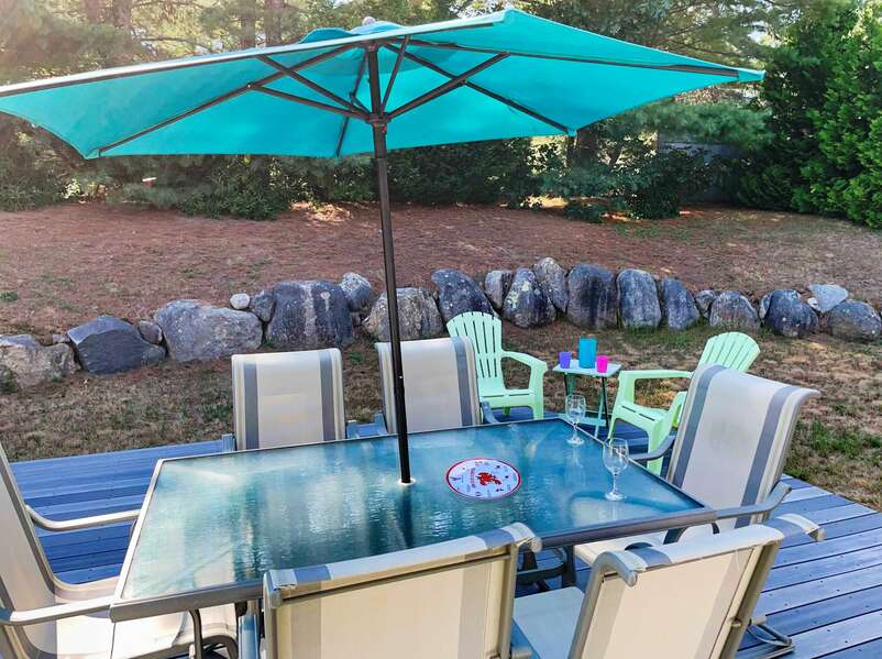 Enjoy privacy and relaxation while dining al fresco - 26 Ridgevale Road South Harwich Cape Cod New England Vacation Rentals #BookNEVRDirectPlaceOnTheCape