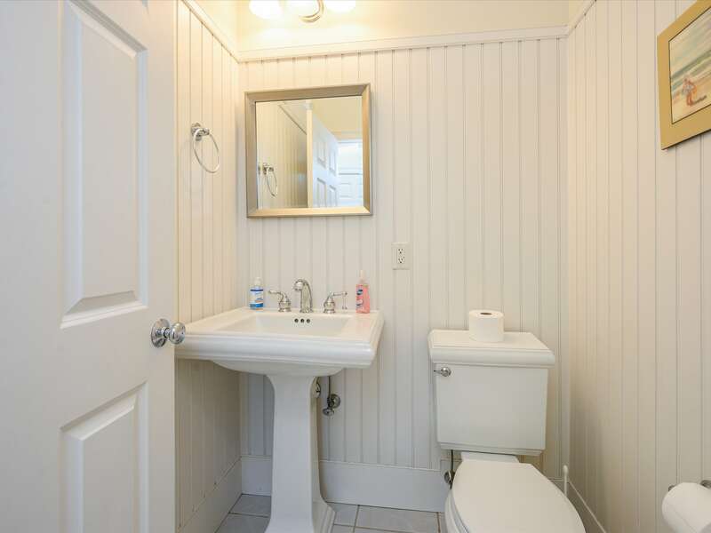 Half bath on first floor by stairs-2 Captains Row E Chatham Cape Cod New England Vacation Rentals-#BookNEVRDirectCaptainsRow