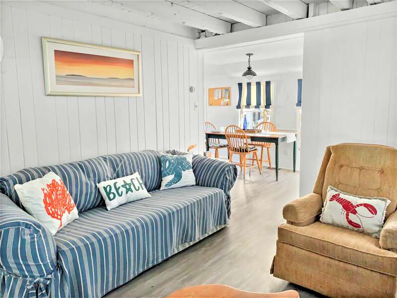 Living room with comfy seating- full bath on the right - 17 Ocean Avenue Harwich Port Cape Cod New England Vacation Rentals