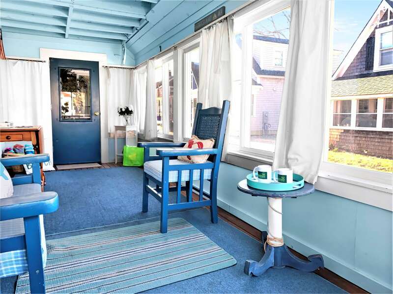 Enjoy your morning coffee on this porch offering easy access to come and go to the beach from the side door - 17 Ocean Avenue Harwich Port Cape Cod New England Vacation Rentals