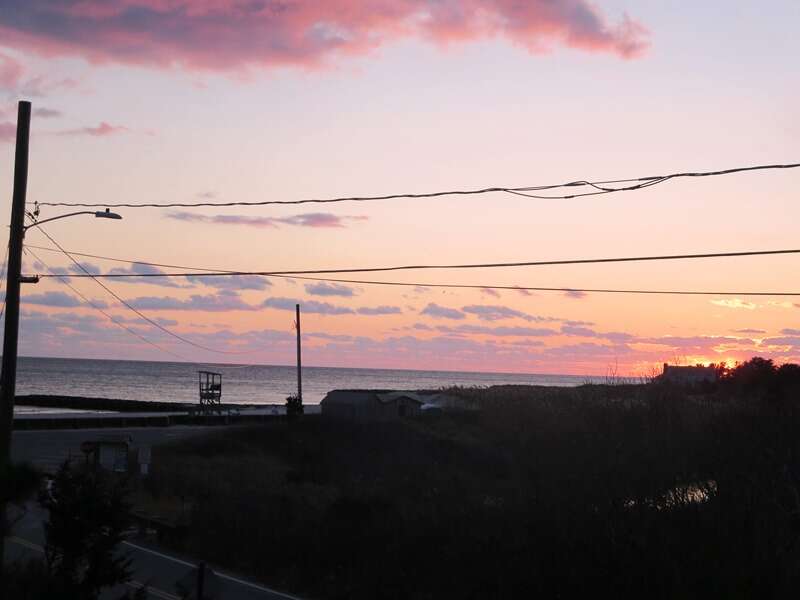 View of the sunset over Nantucket Sound from the upper deck - South Harwich Cape Cod New England Vacation Rentals