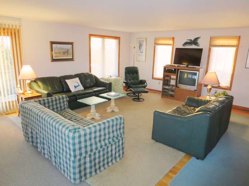Open living room on the 1st floor with a flat screen TV and WiFi - 17 Uncle Venies South Harwich Cape Cod New England Vacation Rentals