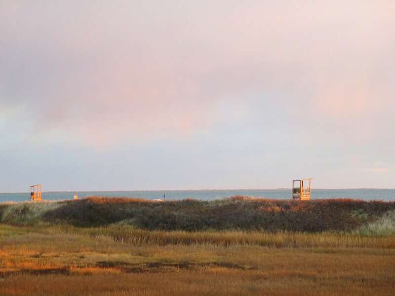 View from the master bedroom deck at sunset - South Harwich Cape Cod New England Vacation Rentals
