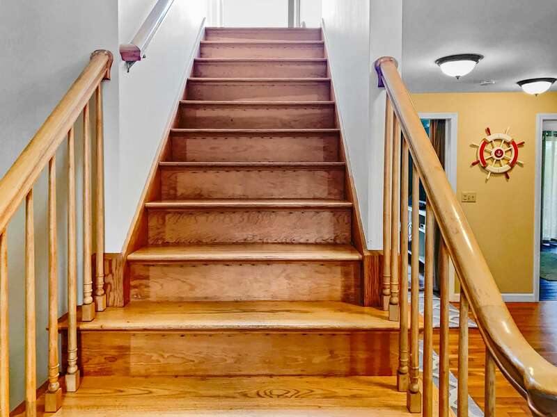 Stairs to the second floor at- 19 Bob White Lane South Harwich Cape Cod New England Vacation Rentals