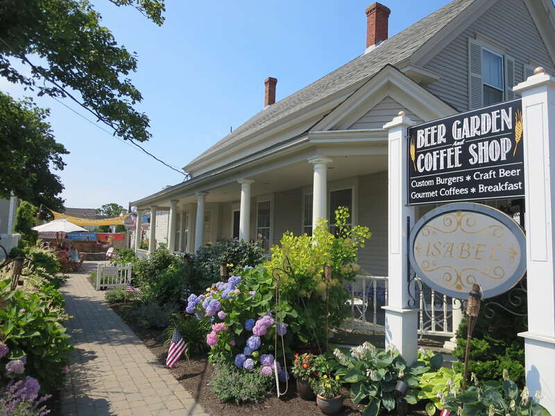 Grab your morning coffee at Perks and stroll through  the village of Harwich Portor stop by their beer garden with a firepit in the evening just a 5.7 mile drive away! - Harwich Port Cape Cod New England Vacation Rentals