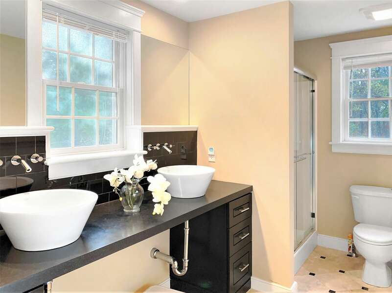 Full bathroom on the 1st floor with a shower  22 Charlene Lane- Harwich- Cape Cod- New England Vacation Rentals