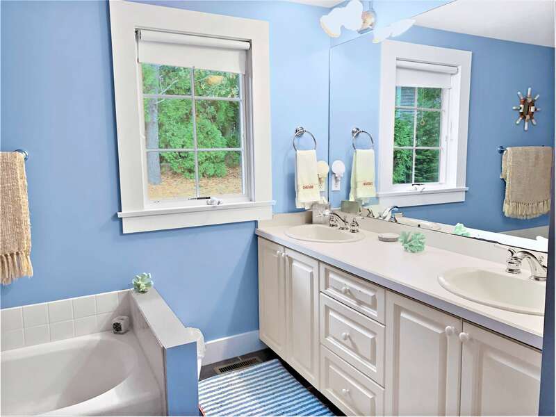 Bathroom 1. Large bathroom with separate bath and shower and double vanity - 58 Longs Lane Chatham Cape Cod New England Vacation Rentals