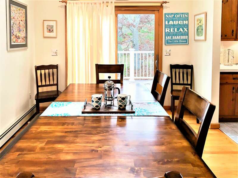 Dining table with slider to deck - 122 Tracy Lane Brewster Cape Cod New England Vacation Rentals