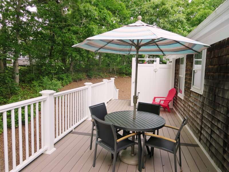 Deck with outdoor seating and Unbrella- 122 Tracy Lane Brewster Cape Cod New England Vacation Rentals