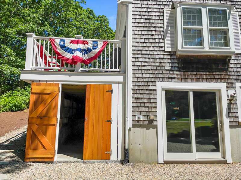 Large storage space under the deck suitable for kayaks,SUPs bicycles or other recreational accoutrements. 122 Tracy Lane Brewster Cape Cod New England Vacation Rentals