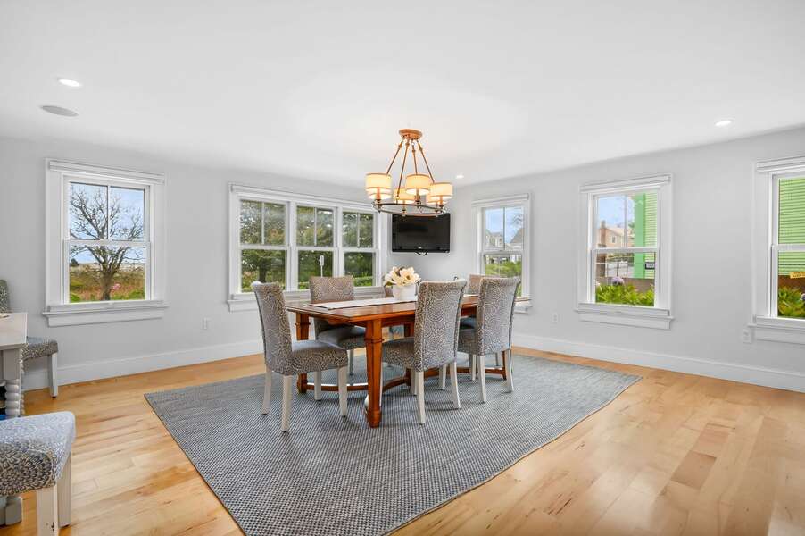 Spacious dining area with peek-a-boo views of the ocean across the street - 201 Main Street Chatham Cape Cod - Sandpiper - NEVR
