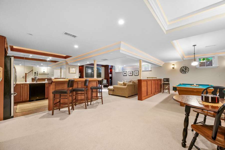 Fabulous lower level entertainment area with bar, pool table, game table TV area, fitness room and full bathroom - 201 Main Street Chatham Cape Cod - Sandpiper - NEVR