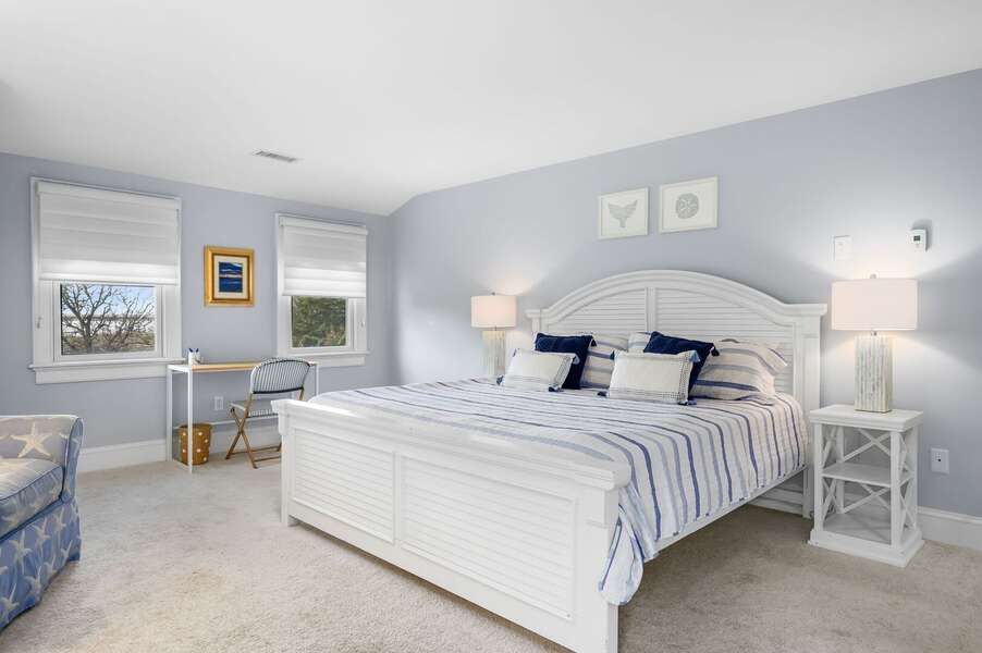 Upper level Primary Bedroom #2 with King sized bed, remote work space and en suite Bathroom #2 - 201 Main Street Chatham Cape Cod - Sandpiper - NEVR