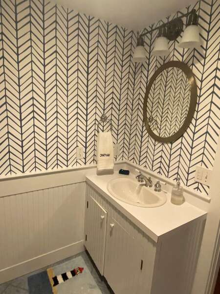 Fun wall paper and nautical hues continued in Bathroom #2 - 58 Longs Lane Chatham Cape Cod New England Vacation Rentals